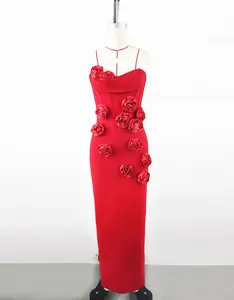Detailed view of red slim-fit evening dress with 3D rose flower decorations