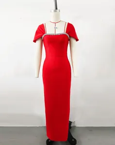 Elegant red floor-length bandage evening gown with rhinestone neckline trim on a dress form