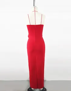 Back view of an elegant red formal midi dress with thin straps shown on a mannequin.