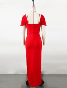 Back detail of a red bodycon evening dress showing the zipper on a mannequin display