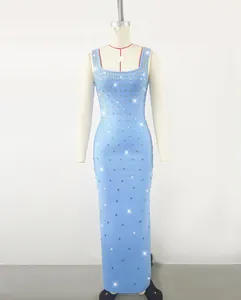 Detail view of light blue bandage dress with sparkling rhinestone accents