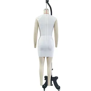 Detailed back view of a white sleeveless knit bandage mini dress on a mannequin stand.