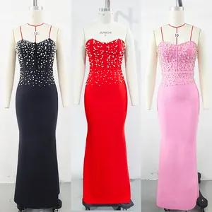 Detailed view of pearl-embellished bandage mermaid evening dresses in black red and pink