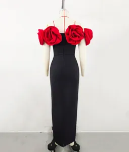 Elegant floor-length black bandage evening dress with oversized red rose floral shoulder details