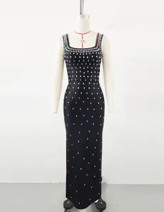 Full view of black bodycon bandage dress featuring teardrop rhinestone embellishments