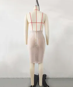 Detailed back view of an elegant beige high-elastic bandage bodycon skirt on a mannequin
