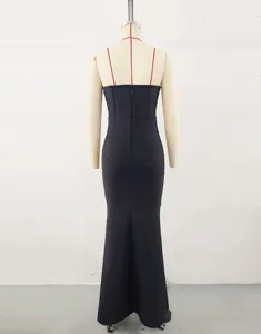Back view detail of black mermaid bandage evening dress on a professional mannequin.