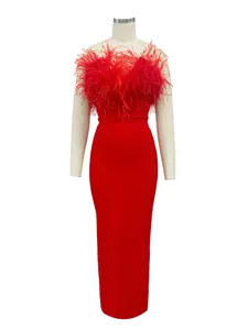 Elegant red bandage evening gown featuring luxury ostrich feather trim on bodice.