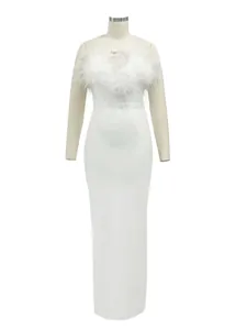 Detail view of a luxury white evening gown with ostrich feather trim on a torso mannequin.
