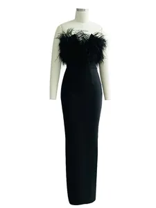 Close-up detail of luxurious ostrich feather trim on black strapless bandage evening gown