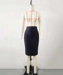 Detailed view of black elastic bandage pencil skirt on a professional tailor mannequin