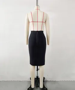 Close-up back view of a black elastic bodycon bandage pencil skirt on a mannequin.