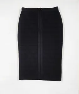Close-up of black elastic bandage skirt with front vertical seam and zipper detail