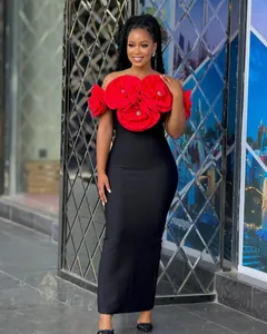 Elegant black off-the-shoulder bandage dress featuring oversized red floral details