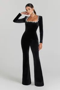 Detailed view of elegant luxury black velvet jumpsuit with crystal flower square neck