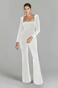 Elegant white velvet jumpsuit with rhinestone square neck and flared legs for women
