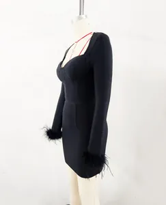 Side view of a black square neck bandage dress featuring elegant ostrich feather cuffs.
