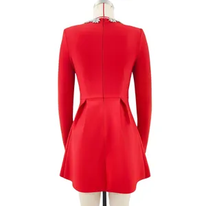 Back view of elegant red French long-sleeved dress with rhinestone collar detail