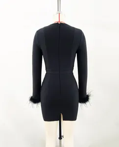 Detailed back view of a black long sleeve bandage dress featuring ostrich feather cuffs