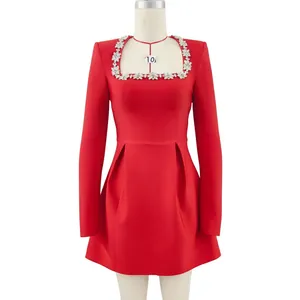 Detailed view of red long sleeve bandage dress with rhinestone floral square neckline