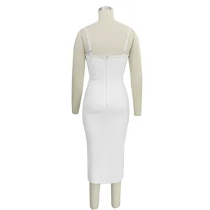 Detailed back view of an elegant white spaghetti strap bandage midi dress on a body mannequin