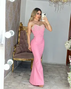 Elegant pink pearl-embellished strapless bandage mermaid evening gown dress detail
