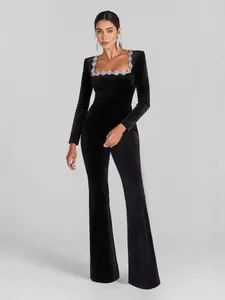 Elegant black velvet flare jumpsuit featuring a diamond square neck and long sleeves