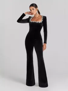 Elegant black velvet jumpsuit featuring crystal square neck and flared legs for women