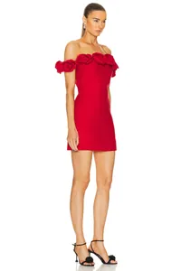 Full-body profile view of elegant red off-the-shoulder dress with 3D floral accents