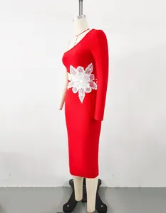 Elegant red one-shoulder bandage dress featuring white floral applique and side cutout
