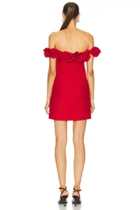 Detailed back view of a red off-the-shoulder mini dress featuring elegant 3D rose accents.