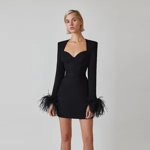 Elegant black square neck bandage mini dress with long sleeves and ostrich feather cuffs