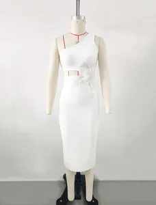 Detailed view of white one-shoulder bandage dress with waist cutout and floral appliqué