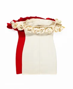 Detail of off-the-shoulder bandage mini dress with 3D floral applique on neckline