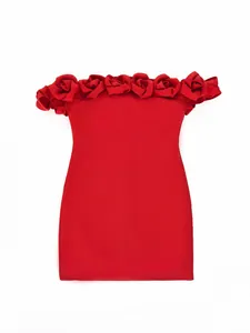 Detailed view of 3D rose embellishments on a red off-shoulder bandage mini dress.