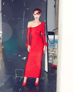 Detailed studio view of an elegant red one-shoulder bodycon dress with 3D floral accents