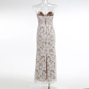 Back view of elegant white floral lace suspender dress with corset-style lace-up detail