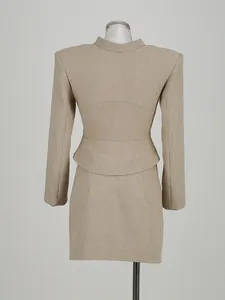Detailed back view of a high-end women's two-piece suit set in premium oatmeal texture