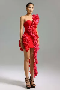 Side view detail of a vibrant red and pink ruffled one-shoulder bodycon mini dress