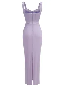 Detailed back view of an elegant lavender long evening dress featuring a corset bodice and back slit