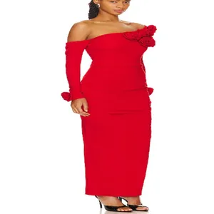 Detail showing 3D rose appliqués and ruched texture on a red one-shoulder dress