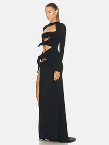Elegant black long-sleeved cut-out maxi dress with sexy high slit and floor-length design