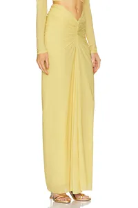 Elegant light yellow long sleeve dress with twisted knot and cropped waist detail