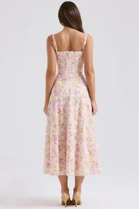 Vista posteriore di un abito midi a fiori rosa con spalline sottili e corpetto a corsetto