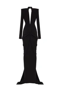 Detail view of an elegant black long-sleeve evening gown with hollow V-neck and mermaid hem