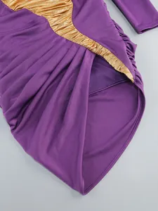 Macro view showing the intricate purple ruching and gold metallic fabric of an evening dress.