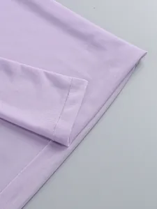 Macro view of lavender mesh fabric texture and neat hem stitching on a sexy formal dress