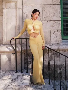 Elegant pale yellow long-sleeved twisted cropped dress for sexy formal spring parties