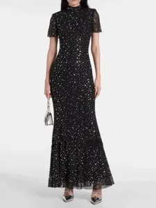 Elegant black fishtail evening gown with sparkling rhinestone details and high neck