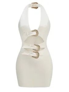 Elegant white halter dress featuring sexy cutout details and sparkling rhinestone buckles
